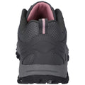 A black and gray athletic shoe is positioned upright showcasing the heel area with pink accents the shoe features textured fabric and a rugged outsole designed for grip and stability