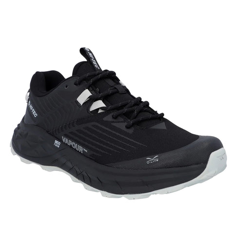 A black trail running shoe displays a breathable upper mesh and durable sole designed for traction on various terrains positioned against a plain white background emphasizing its features.