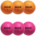 Four golf balls are arranged in two rows with the top row featuring two orange balls and the bottom row featuring two pink balls all marked with the brand name Volvik and the number one