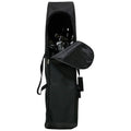 A tall black bag partially unzipped reveals a set of golf clubs inside with a small flap open at the top surrounded by a plain white background.