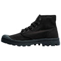 Black high-top sneaker features a canvas upper with metal eyelets for laces and a rubber toe cap. Its rugged sole suggests suitability for outdoor activities or casual wear.