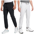 Two pairs of athletic pants in black and white are displayed side by side. They are worn by individuals standing with hands relaxed, set against a neutral background.