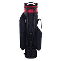 A black and red golf bag stands upright featuring multiple compartments and a padded top for club storage it is designed for carrying golf equipment during play