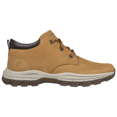 A tan leather shoe with a sturdy sole featuring laces is displayed from the side on a white background, emphasizing its casual yet durable design suitable for outdoor activities.