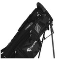 A black golf bag is upright with two legs extended the bag features multiple zippered pockets and branding text that includes "XTREME 6.5" and "COUGAR" on its sides.