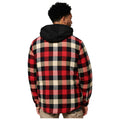 A person is wearing a red and black plaid shirt with a black hood. They are facing away, shown in a simple environment with a plain background.