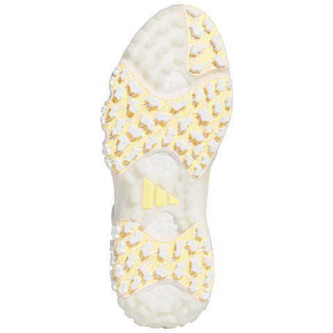 Shoe sole features a textured yellow and white pattern designed for grip and traction while resting on a plain white background. The Adidas logo is visible near the center.