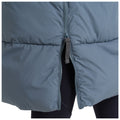 A half-zippered light blue puffer jacket hangs loosely over a pair of fitted black leggings showcasing a casual outdoor attire ready for layering in a cool environment.