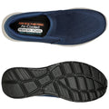 A blue slip-on shoe is displayed with a visible textured fabric upper featuring ventilation. The shoe’s interior includes a label indicating Skechers Air-Cooled Memory Foam and Relaxed Fit. The black sole shows a detailed tread pattern.