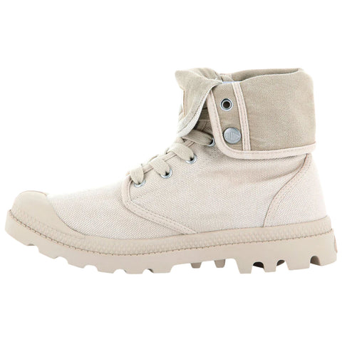 A beige ankle boot with a canvas upper features a lace-up design and a folded cuff. The boot has a rugged sole, suitable for outdoor activities.