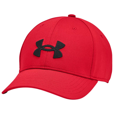 A red baseball cap features a prominent black Under Armour logo on the front and has a curved brim, designed for casual wear or sports activities.