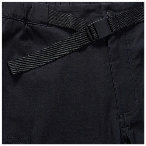 Black fabric waistband with an adjustable buckle strap is positioned at the top left side against a dark background highlighting the texture and stitching of the fabric