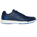 A navy golf shoe with a smooth upper and rubber spikes on the sole rests on a white background, showcasing its streamlined design and contrasting blue accents.