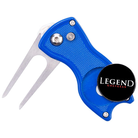 A blue golf tool with a forked end is positioned upright showcasing its sharp prongs while a circular black button featuring the text LEGEND GOLFGEAR is attached to its side.