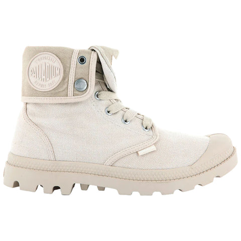 Beige canvas ankle boot features laces and a rounded toe with a textured rubber sole and a logo patch on the tongue suitable for casual outdoor wear.