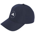 A navy blue cap with a rounded brim features a circular logo that includes the text "ADIDAS GOLF THE BRAND WITH 3 STRIPES" surrounding a three-stripe graphic design.