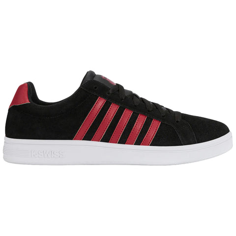 A black sneaker with red stripes features a suede upper and a white rubber sole positioned on a flat surface showcasing a sporty and casual design suitable for everyday wear.