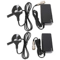 Two power adapters are displayed side by side with black cases and multiple connecting wires. Each adapter connects to a standard plug, displayed along with a coaxial connector.