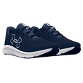 Navy athletic shoes with a white logo sit side by side on a plain background showcasing their sleek design and breathable material aimed for performance and comfort.