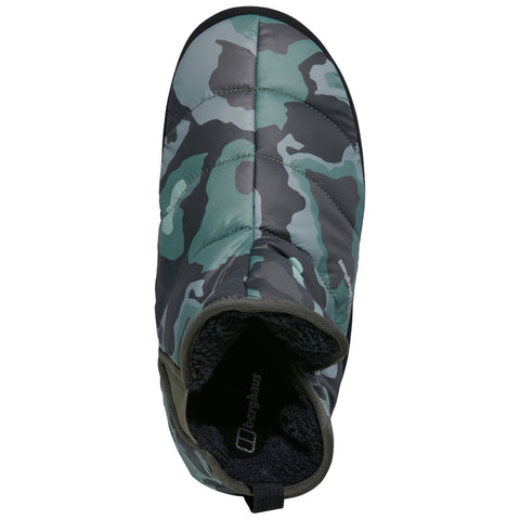 A green and gray camouflaged boot is displayed with a puffy exterior and a soft interior lining designed for warmth and comfort intended for cold weather activities.