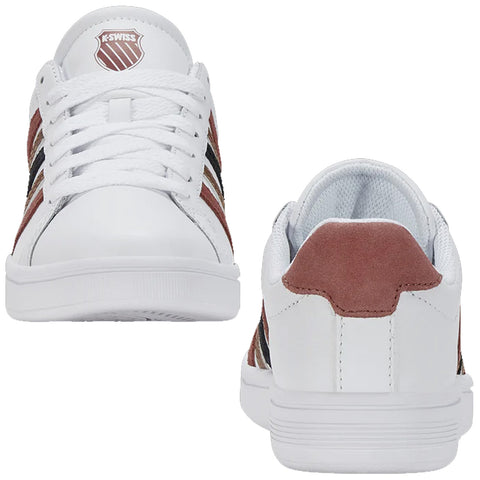 White athletic shoes with a brown and black striped design are positioned upright front and back showcasing the laces and suede heel details against a plain background.