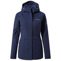 A navy blue jacket is displayed hanging upright with a hood visible and features a zippered front and pockets suggesting it is designed for outdoor use in cool weather.