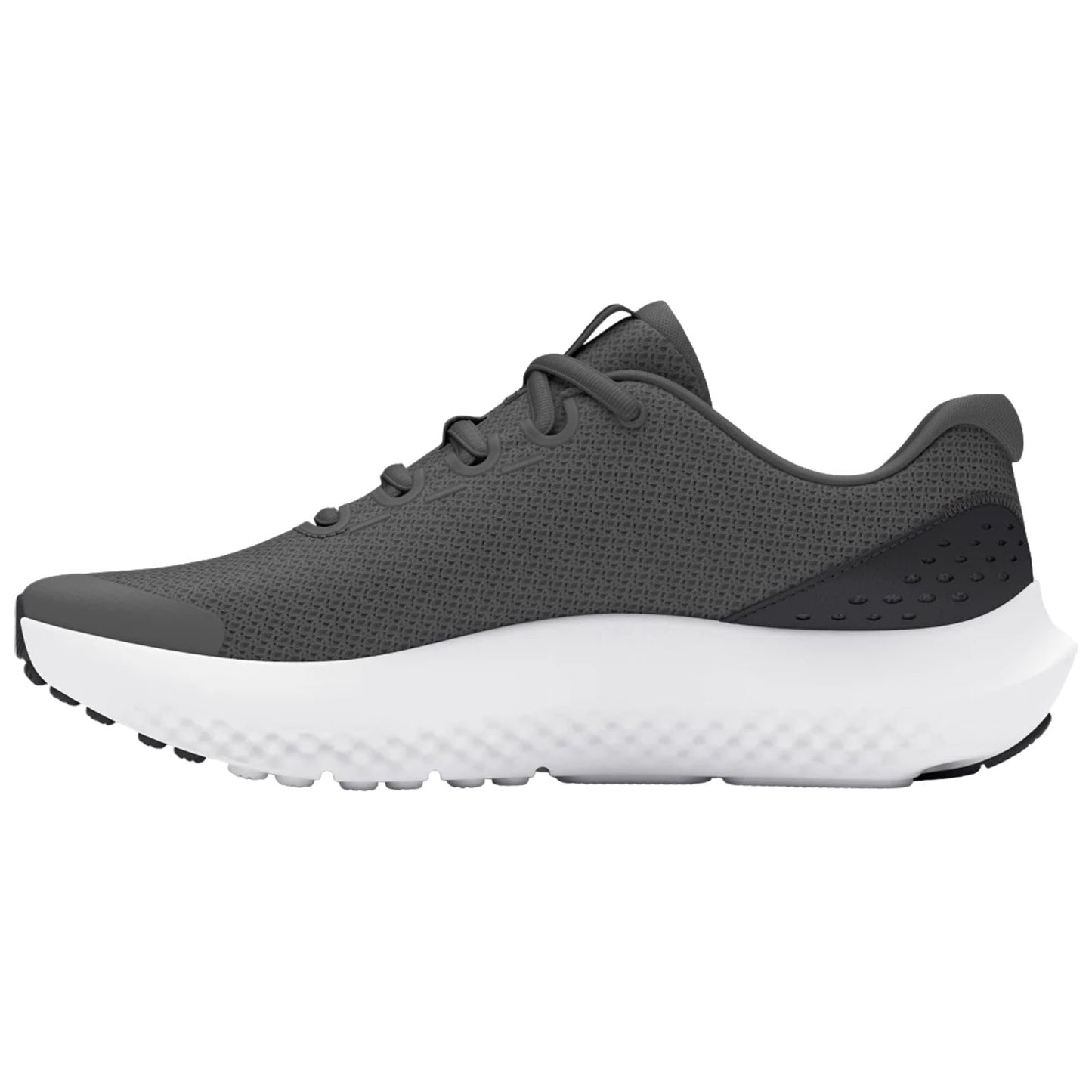 A gray athletic shoe with a textured upper and a white cushioned sole is positioned on a flat surface showcasing its modern design made for comfort during physical activities.