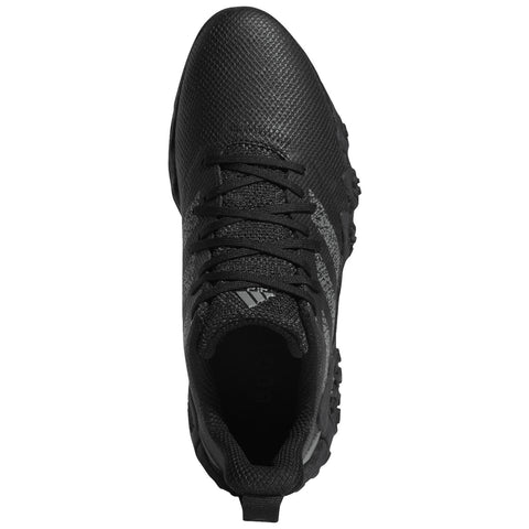 A black athletic shoe is positioned upright showcasing its textured surface and laces in perfect alignment set against a plain white background.