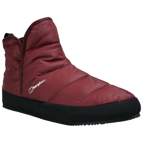 A red insulated boot with a high collar rests on a flat surface showcasing a padded exterior and contrasting black rubber sole ideal for cold weather wear.