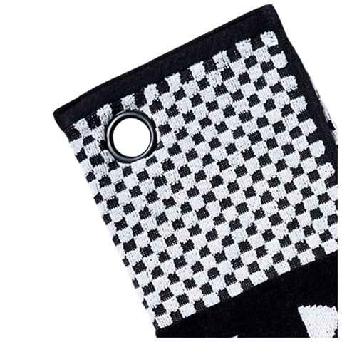 A black and white checkered fabric object is displayed with a circular metal eyelet at one corner suggesting it may be used for hanging or attachment in a textured pattern environment