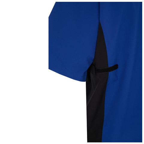 A blue shirt sits with a black side panel and a small black strap on the side suggesting utility the fabric appears smooth and vibrant against a white background.