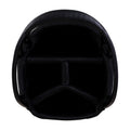 A black padded helmet is viewed from above revealing its interior compartments designed for cushioning and support in a protective context likely for sports or safety activities.