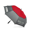 A large golf umbrella features a red and gray design with the text "BIG MAX" and "aqua UV-PROTECTION" displayed prominently. It is open and ready for use in outdoor settings.