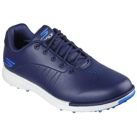 A navy blue golf shoe designed for performance features a sleek upper with textured detailing and a white sole with visible spikeless traction elements suitable for grip on the course.