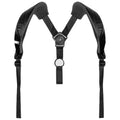 A black harness with padded shoulder straps is positioned upright its straps connected at a central point designed for holding and securing objects in place during movement.