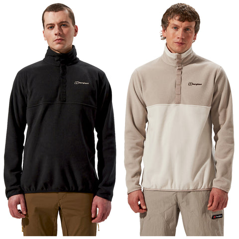 Two men stand side by side wearing different styles of fleece pullovers. One is in black and the other in beige and cream, both featuring high collars and brand logos.