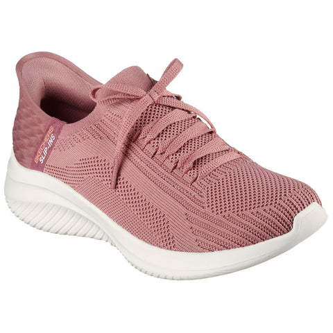 A pink athletic shoe rests at an angle showcasing a knitted upper and laces while the white sole highlights its cushioned design against a plain background.