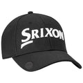 A black baseball cap with a white embroidered logo reading "Srixon" on the front rests on a flat surface showcasing its curved brim and structured design.