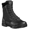 A black tactical boot stands upright featuring a sturdy rubber sole and reinforced toe with laces tightly secured reflecting a design meant for durability and performance in demanding environments.