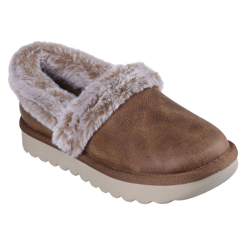 A single brown slipper is positioned upright showcasing a soft faux fur collar and a textured surface the context indicates it is designed for indoor comfort and warmth.