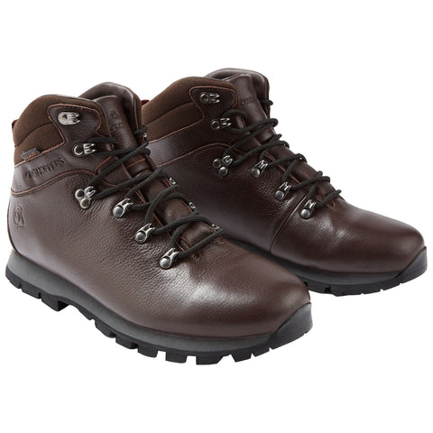 Brown hiking boots are positioned side by side showcasing their leather material and durable soles laced tightly indicating readiness for outdoor activities in rugged terrain.