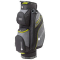 A golf bag is standing upright featuring multiple zippered pockets in black and gray with green accents it is designed for carrying golf clubs and accessories.