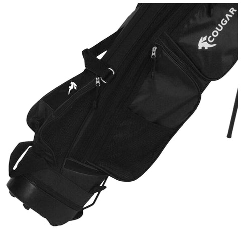 A black bag with multiple compartments is shown resting at an angle with a firm handle attached The bag appears to be designed for carrying sports equipment or accessories