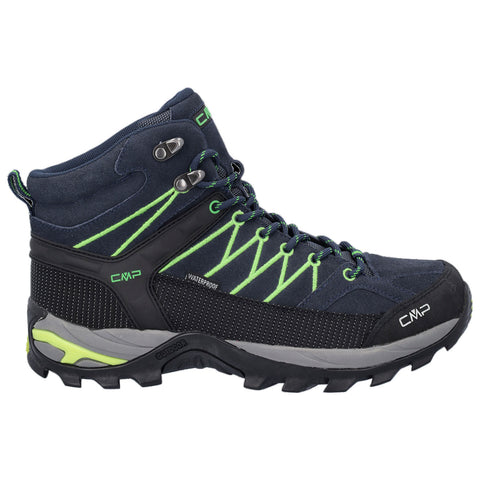 A waterproof hiking boot features dark blue fabric with green accents laced through metal eyelets designed for outdoor activities providing support and traction in rugged terrain.