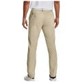 A person is wearing light-colored golf chinos with an elastic waistband, standing with their back facing the viewer in a casual setting. The look is complemented by white shoes and a short-sleeved shirt, ideal for a relaxed golfing outfit.