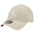 A beige baseball cap with a white embroidered NY logo rests at an angle the cap features a textured surface and a curved brim designed for casual wear and sun protection