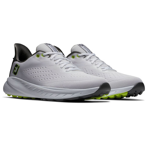 A pair of white athletic shoes with a sleek design sits on a flat surface the shoes feature a textured upper and contrasting black and neon green accents for style and grip.