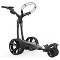 A golf push cart stands upright with a handle and large wheels designed for easy maneuverability on various terrains providing support for golfers transporting their gear across the course.