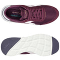 A pair of burgundy athletic shoes is displayed from two angles showcasing the upper with mesh detailing and the white sole with traction patterns on the bottom.