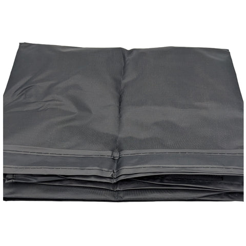 A folded black tarp lies flat on a surface showcasing a smooth texture with visible seams highlighting its utility for outdoor protection or covering purposes.